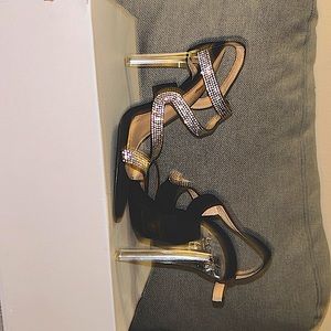 Black and rhinestone 6-inch heels.